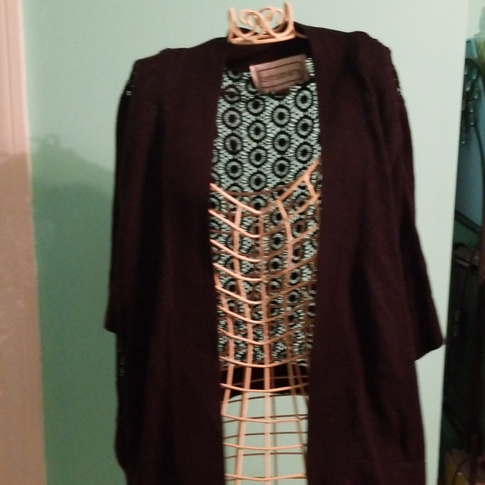 A black shrug